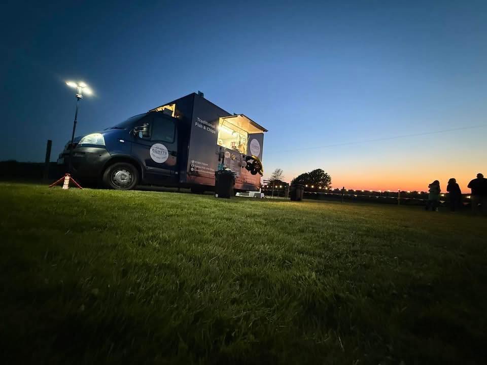 Coney Fish and chips van in field